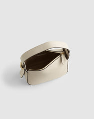 The Sculpted Metal Wristlet Bag VINTAGE MUSLIN