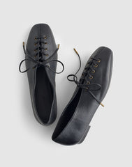 The Mylie Lace-Up Glove Flat in Leather TRUE BLACK