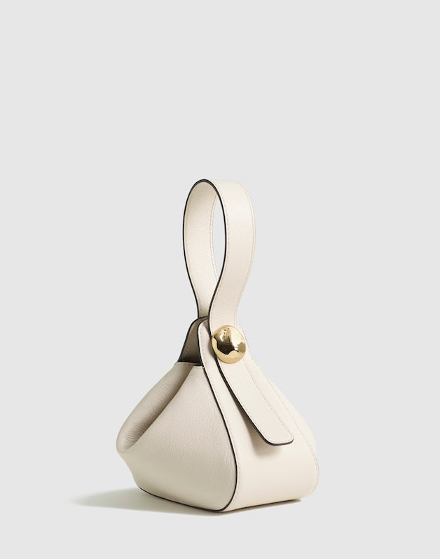 The Sculpted Metal Wristlet Bag VINTAGE MUSLIN
