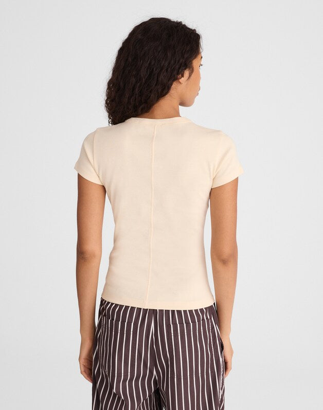 The '90s V-Neck Baby Tee in Compact Cotton VANILLA