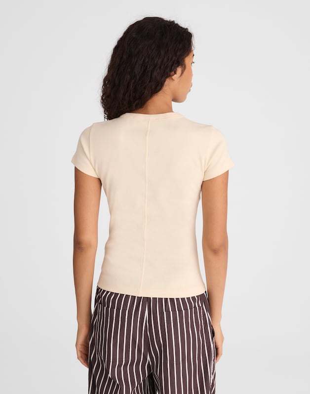 The '90s V-Neck Baby Tee in Compact Cotton VANILLA