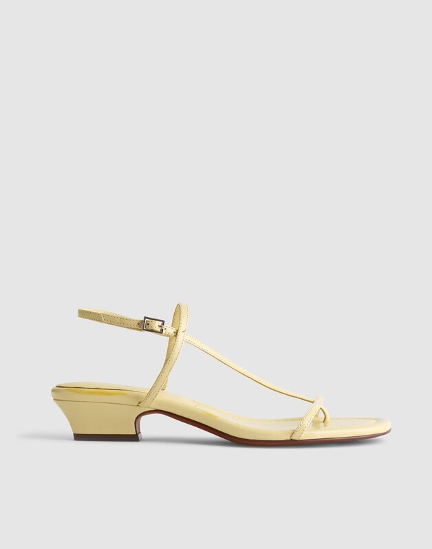 The Maycie Asymmetric T-Strap Sandal in Patent Leather PALE PINEAPPLE