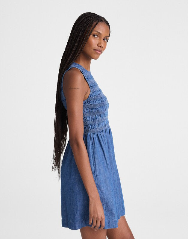 The Denim Melody Smocked Mini Dress COVE WASH