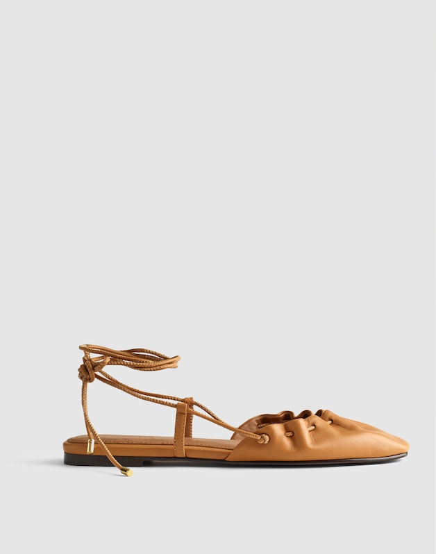 The Greta Ruched Ankle-Tie Flat in Leather GOLDEN TAN